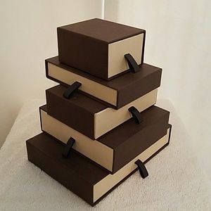Tower of (5) Louis Vuitton boxes.